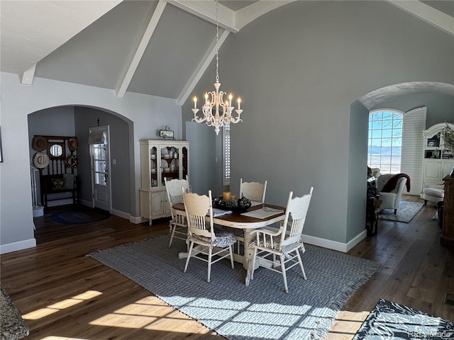 dining room featuring dark wood-type flooring, beam ceiling, high vaulted ceiling, and a notable chandelier