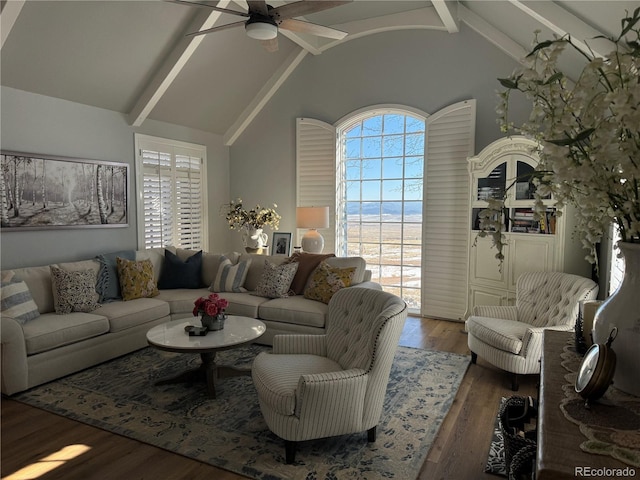 living room featuring lofted ceiling with beams, ceiling fan, and dark hardwood / wood-style flooring