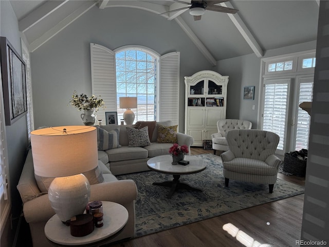 living room with vaulted ceiling with beams, hardwood / wood-style flooring, and ceiling fan