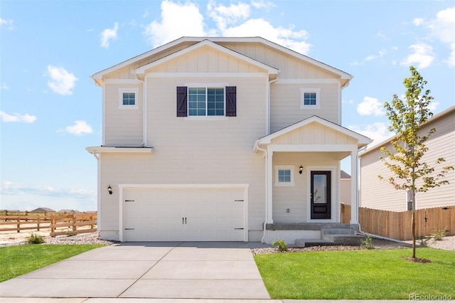 7322 Green River Ave, Frederick, CO 80530 - view of front facade with an attached garage, driveway, and board and batten siding