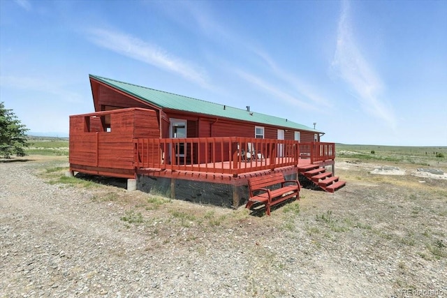 3316 Carlson Rd, Rye, CO 81069 - rear view of property featuring a wooden deck and a metal roof