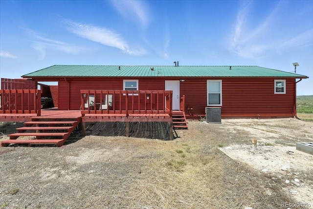 3316 Carlson Rd, Rye, CO 81069 - rear view of house with a deck, log veneer siding, and a metal roof