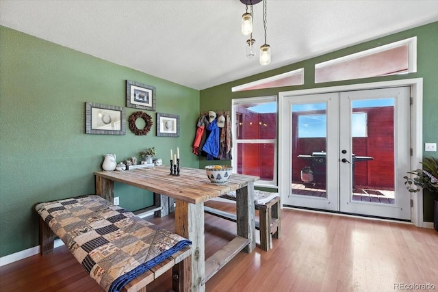 3316 Carlson Rd, Rye, CO 81069 - dining space with french doors, wood finished floors, and vaulted ceiling