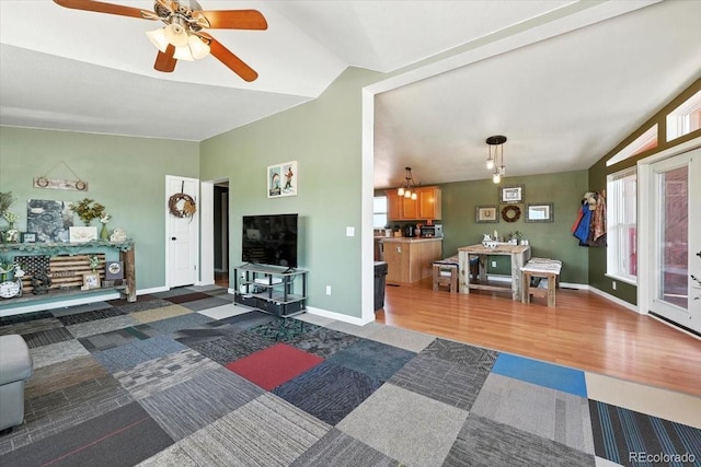 3316 Carlson Rd, Rye, CO 81069 - living area featuring a ceiling fan, vaulted ceiling, and wood finished floors