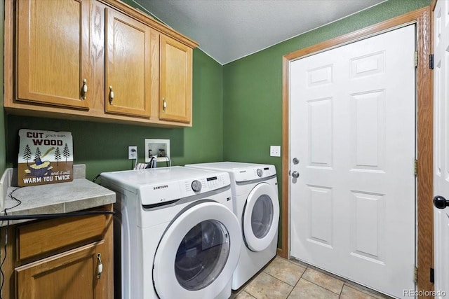 3316 Carlson Rd, Rye, CO 81069 - washroom with cabinet space, washing machine and dryer, and light tile patterned flooring