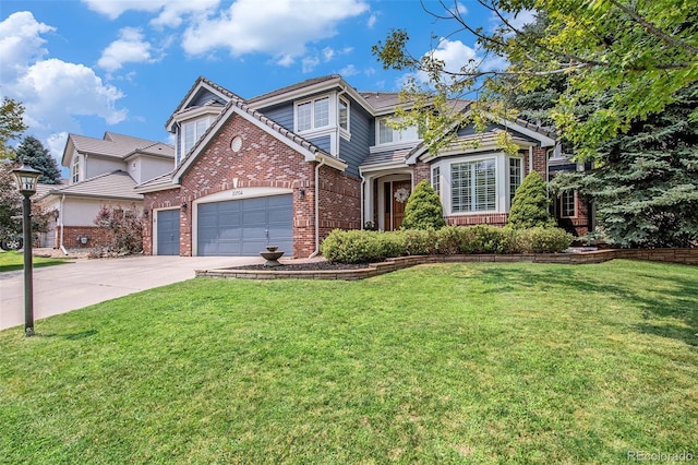 view of front facade with concrete driveway, an attached garage, brick siding, and a front yard