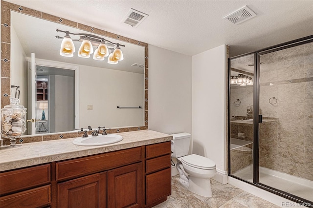 bathroom with a shower stall, toilet, visible vents, and a textured ceiling