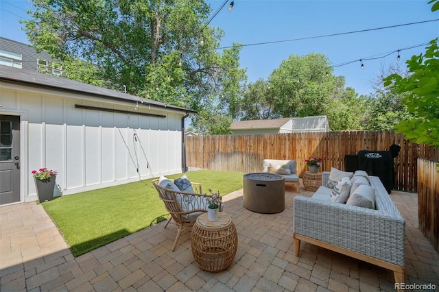 2571 S Cherokee St, Denver, CO 80223 - fenced backyard featuring a patio