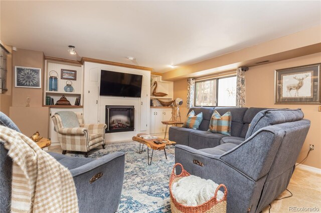 5298 Pony Creek Cir, Colorado Springs, CO 80919 - living area with a large fireplace and light carpet