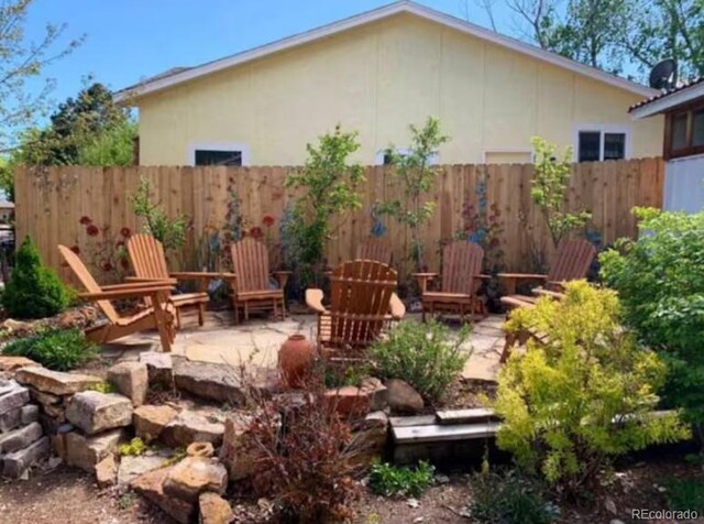 5298 Pony Creek Cir, Colorado Springs, CO 80919 - view of yard featuring a patio
