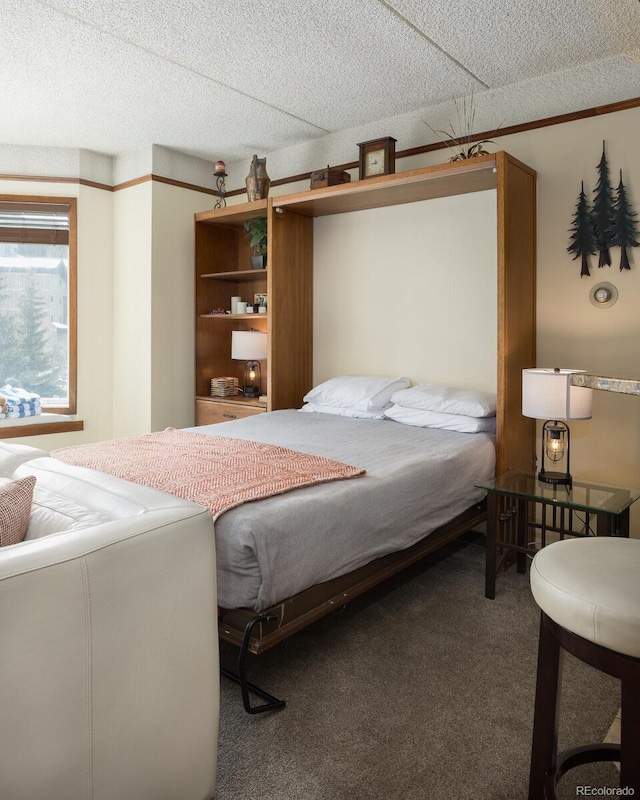 carpeted bedroom with a textured ceiling