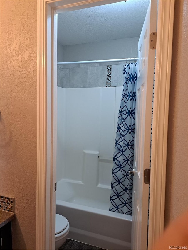 2226 W Elizabeth St Unit C304, Fort Collins, CO 80521 - full bath with toilet, a textured wall, shower / bathtub combination with curtain, and vanity