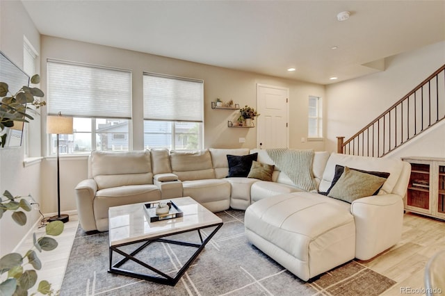 3765 W 88th Ct, Westminster, CO 80031 - living room featuring wood finished floors, plenty of natural light, recessed lighting, and stairs