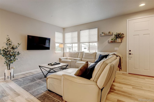 3765 W 88th Ct, Westminster, CO 80031 - living area featuring light wood-style flooring, baseboards, and recessed lighting