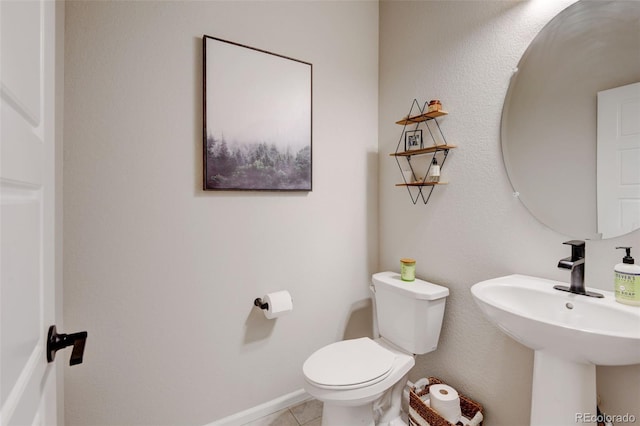 3765 W 88th Ct, Westminster, CO 80031 - half bath featuring toilet, tile patterned floors, and a sink