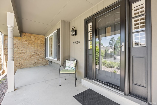 3726 E Nichols Ave, Centennial, CO 80122 - entrance to property with covered porch and brick siding