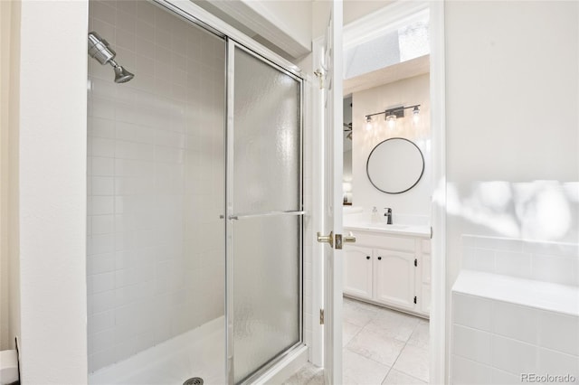 3726 E Nichols Ave, Centennial, CO 80122 - full bath with a shower stall, vanity, and tile patterned floors