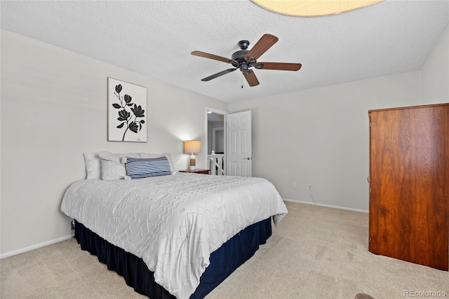 3726 E Nichols Ave, Centennial, CO 80122 - carpeted bedroom with baseboards, ceiling fan, and a textured ceiling
