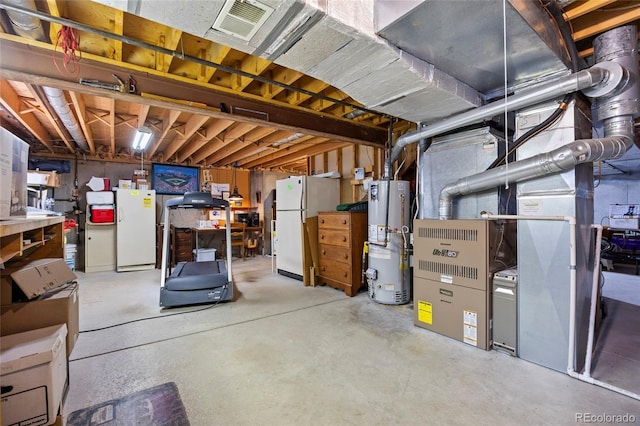 3726 E Nichols Ave, Centennial, CO 80122 - unfinished below grade area featuring water heater and freestanding refrigerator