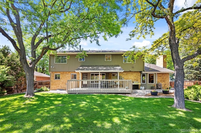 3726 E Nichols Ave, Centennial, CO 80122 - rear view of property with brick siding, a chimney, a wooden deck, and a patio area