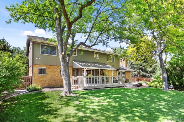 3726 E Nichols Ave, Centennial, CO 80122 - back of property with brick siding and a deck