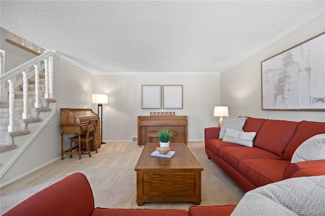 3726 E Nichols Ave, Centennial, CO 80122 - living room with carpet flooring, ornamental molding, a textured ceiling, stairs, and baseboards