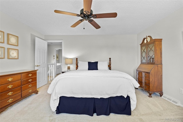 3726 E Nichols Ave, Centennial, CO 80122 - bedroom with light colored carpet, a textured ceiling, and ceiling fan