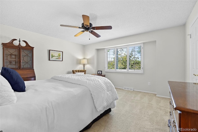 3726 E Nichols Ave, Centennial, CO 80122 - bedroom featuring light carpet, a textured ceiling, and ceiling fan