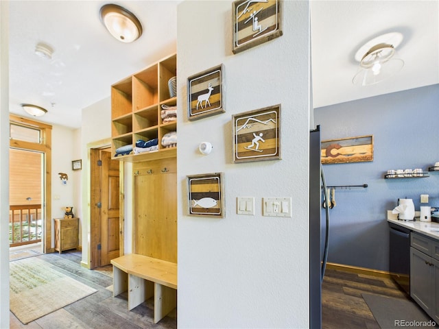 27 Lake Ridge Cir Unit 1842, Dillon, CO 80435 - mudroom featuring dark wood-style floors and baseboards