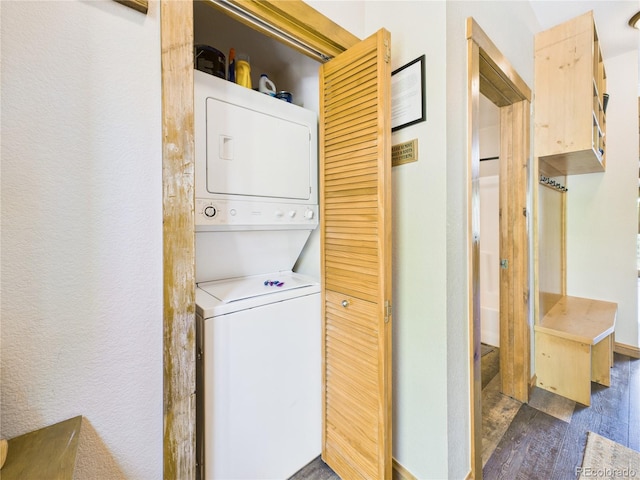 27 Lake Ridge Cir Unit 1842, Dillon, CO 80435 - washroom featuring stacked washer / drying machine and dark wood-type flooring