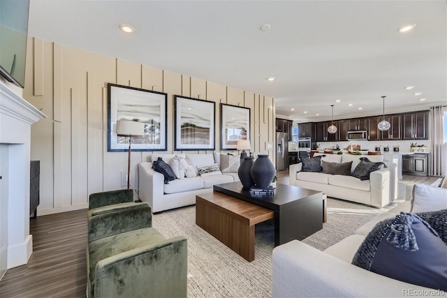 living area featuring recessed lighting and wood finished floors