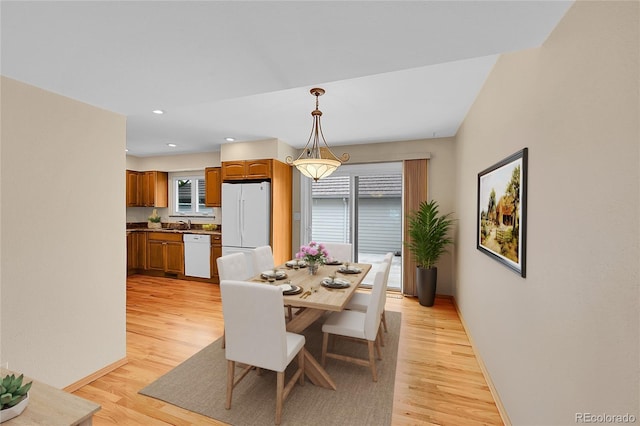 9930 W Progress Pl, Littleton, CO 80123 - dining space featuring light wood-style floors, baseboards, and recessed lighting