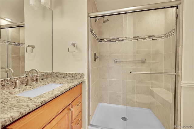 9930 W Progress Pl, Littleton, CO 80123 - bathroom featuring a shower stall and vanity