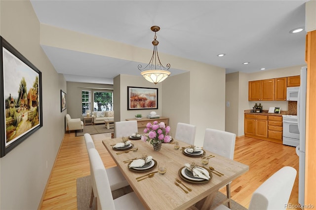 9930 W Progress Pl, Littleton, CO 80123 - dining room featuring light wood-style flooring and recessed lighting