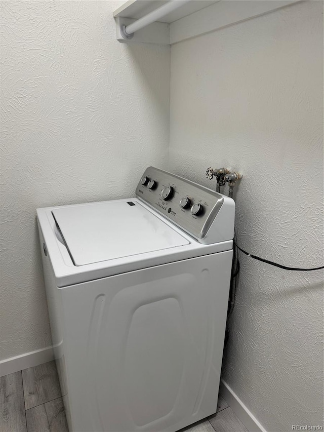 laundry room featuring washer / dryer