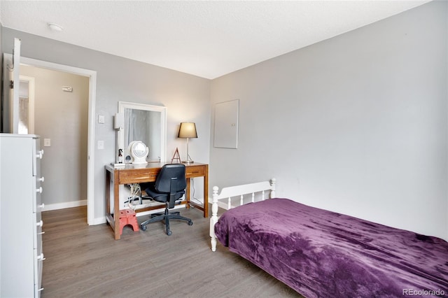 bedroom with light hardwood / wood-style floors