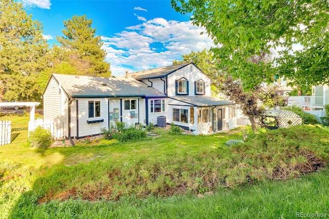 7681 S Jellison St, Littleton, CO 80127 - view of front facade with a sunroom and roof with shingles