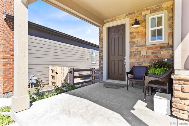 property entrance with a porch