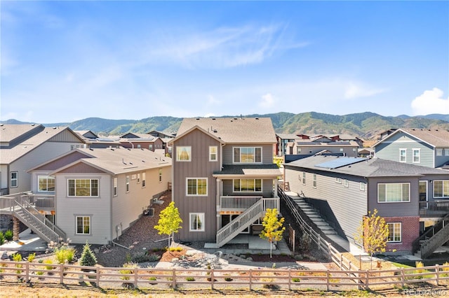 view of front of property with a mountain view