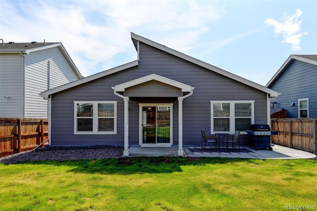 719 S Hoover Ave, Fort Lupton, CO 80621 - back of property with a patio area