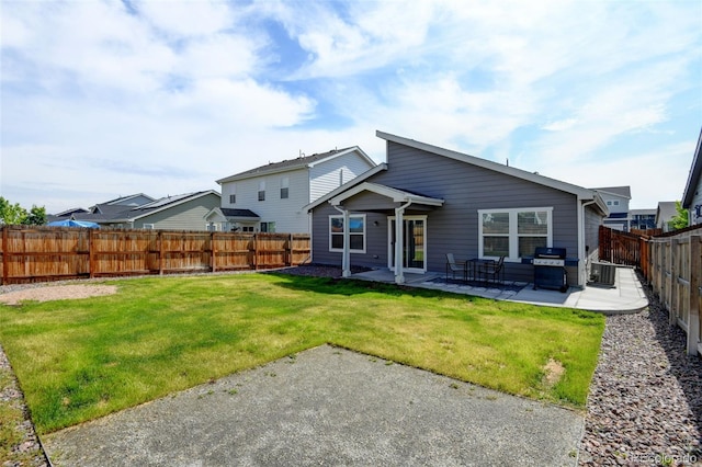 719 S Hoover Ave, Fort Lupton, CO 80621 - back of property featuring a patio area