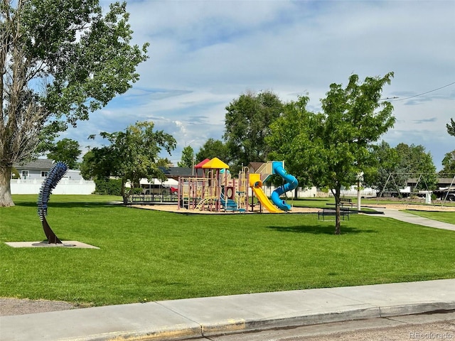 719 S Hoover Ave, Fort Lupton, CO 80621 - community jungle gym featuring a yard