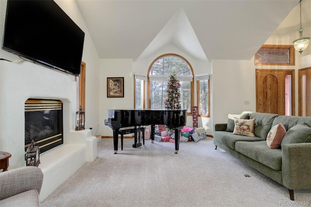 living room with carpet and vaulted ceiling