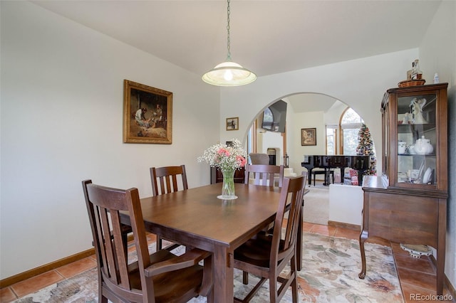 dining area with tile patterned flooring