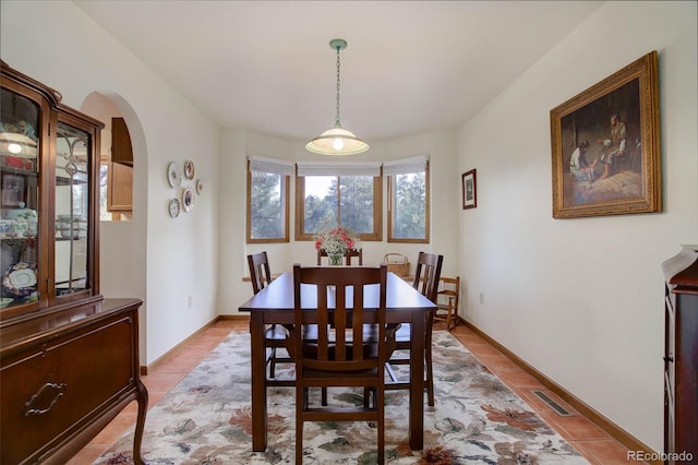 dining room with light tile patterned floors