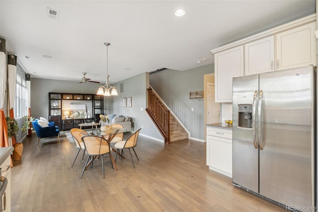 19067 W 57th Dr, Golden, CO 80403 - dining area featuring stairs, ceiling fan, light wood finished floors, and recessed lighting