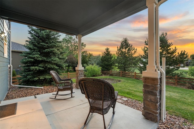 19067 W 57th Dr, Golden, CO 80403 - patio terrace at dusk featuring a patio