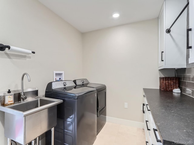 7273 Silverhorn Dr, Evergreen, CO 80439 - laundry area featuring cabinet space, separate washer and dryer, baseboards, and recessed lighting