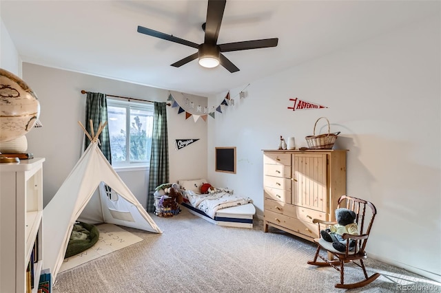 bedroom with ceiling fan and carpet