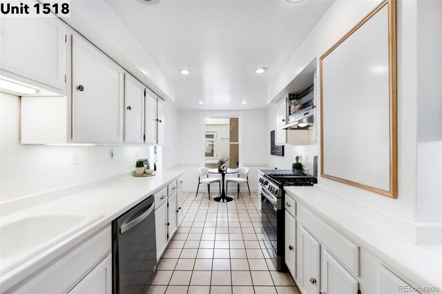 kitchen featuring light countertops, light tile patterned floors, white cabinets, stainless steel appliances, and recessed lighting
